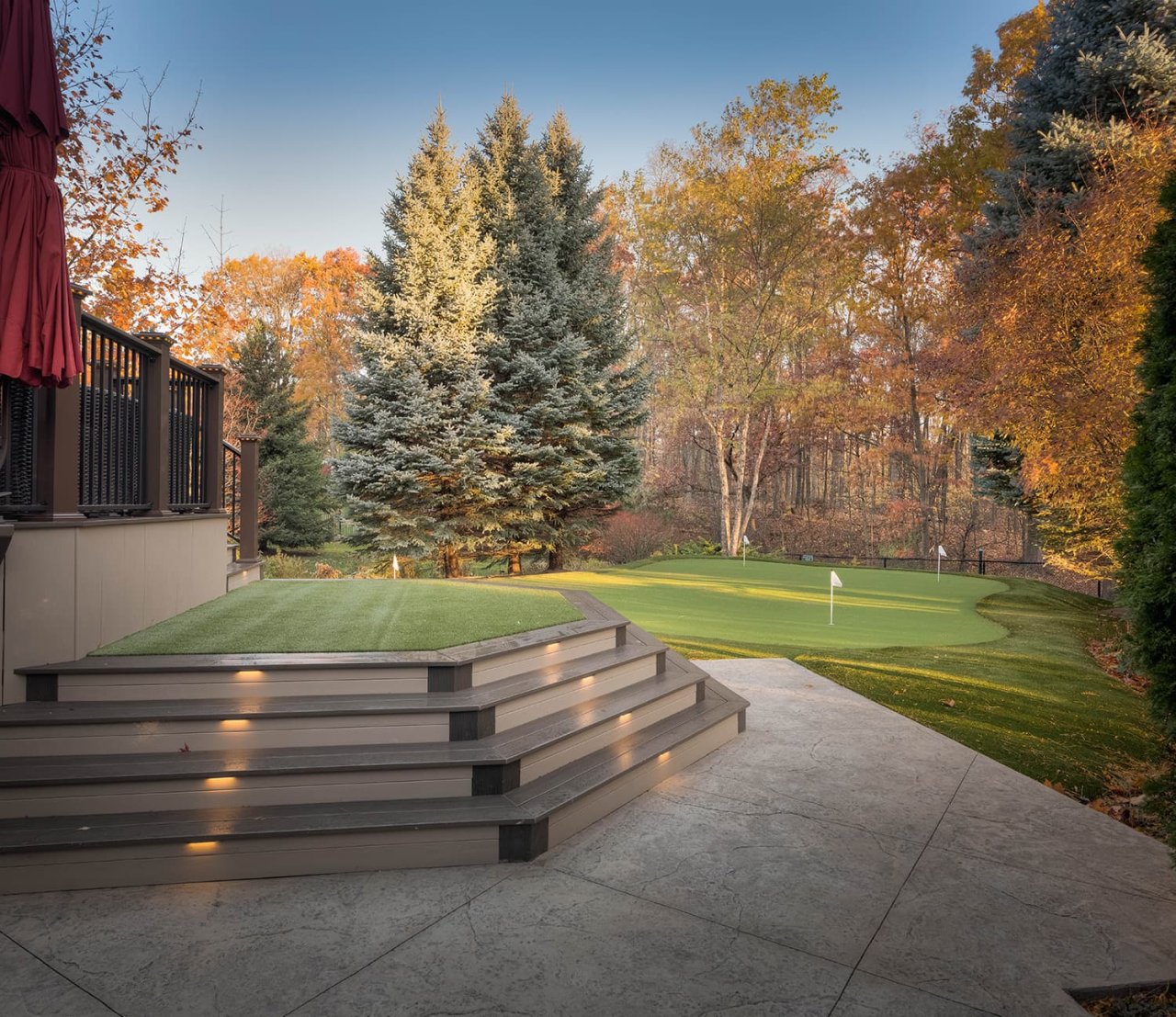 Backyard with putting greens.