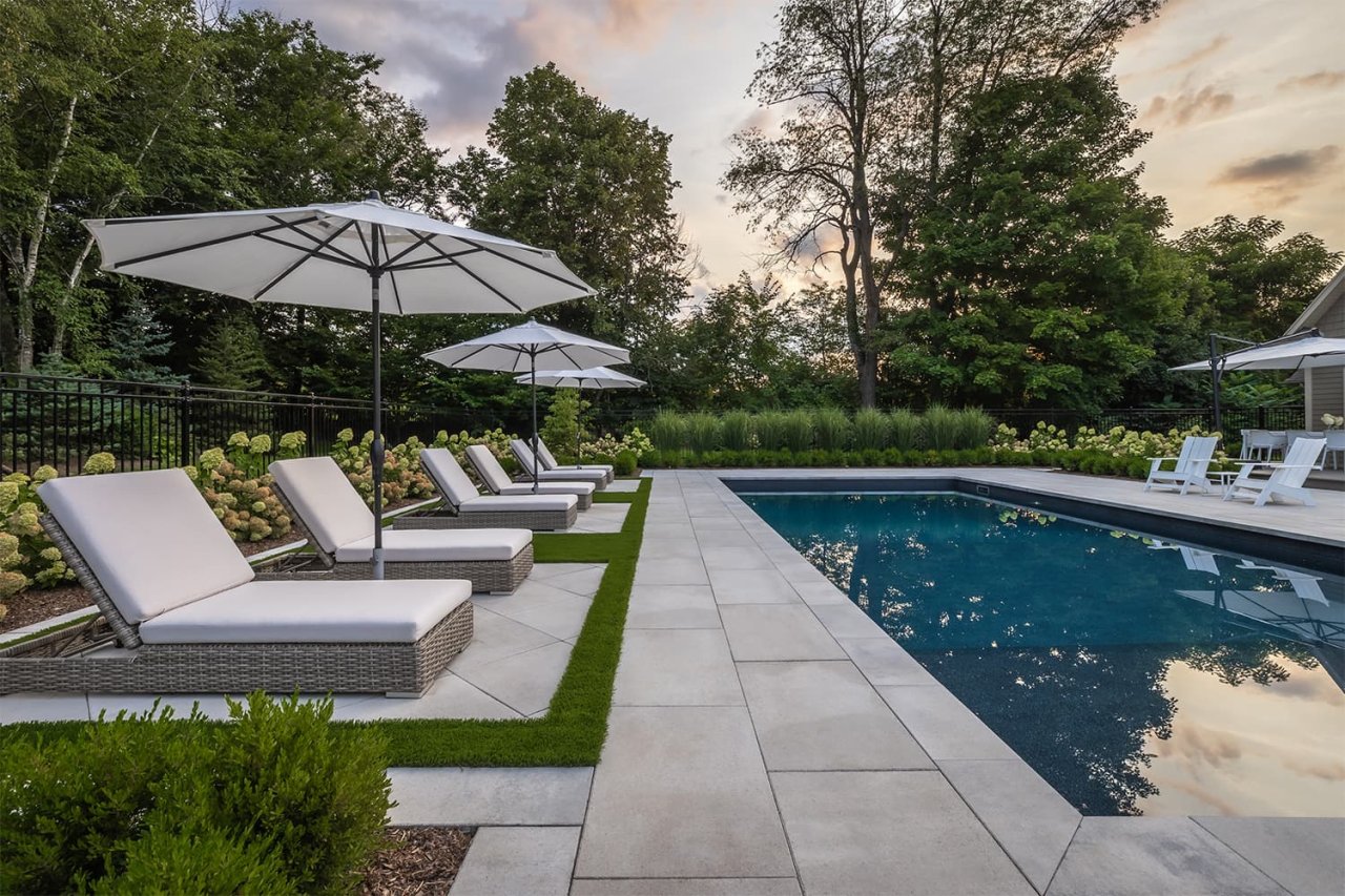 Backyard pool with seatings.